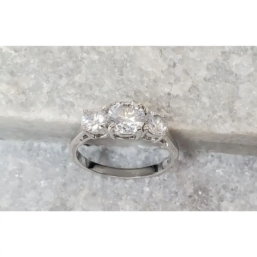 Avon RJ Graziano Past Present Future Cubic Zirconia CZ Silver Tone Ring Sz 9.25
